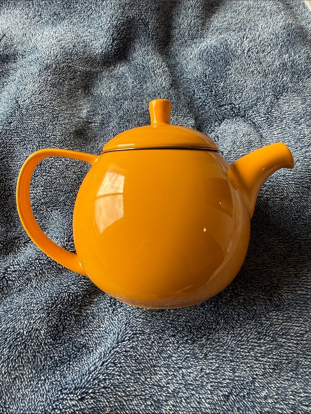 Bright Orange Ceramic Teapot with Round Silhouette